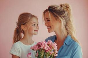A joyful mother and daughter share a special moment with pink flowers against a pastel background photo