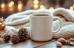 Warm cozy mug with pinecones and knitted blanket on a chilly autumn afternoon photo