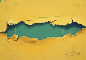 Artistic torn paper revealing tranquil ocean view with bright yellow background photo