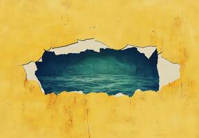 Artistic torn paper revealing tranquil ocean view with bright yellow background photo
