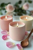Tranquil ambiance with pink candles surrounded by rose petals on a simple surface photo