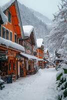 Snow covered village street in winter with shops and visitors enjoying the scenery photo