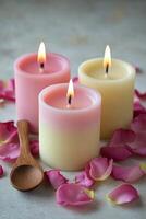 Tranquil ambiance with pink candles surrounded by rose petals on a simple surface photo