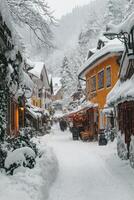 Snow covered village street in winter with shops and visitors enjoying the scenery photo