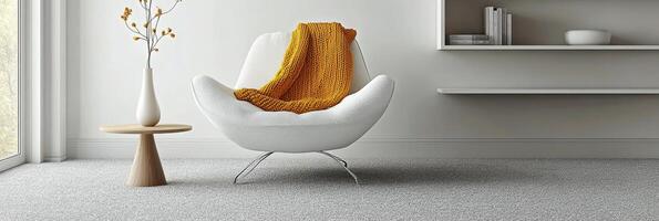 Cozy living room corner featuring a white chair and a warm yellow blanket on a bright afternoon photo
