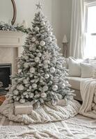 A beautifully decorated Christmas tree with ornaments and presents in a cozy living room setting photo