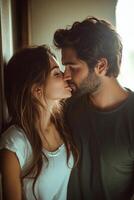 Romantic moment between a couple indoors during early evening light photo