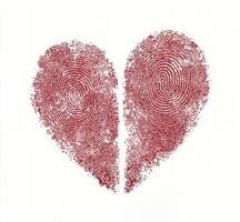 Unique heart shape created from vibrant fingerprint patterns showcasing love and individuality photo