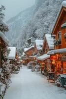 Snow covered village street in winter with shops and visitors enjoying the scenery photo