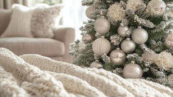 Cozy winter holiday scene with a decorated Christmas tree and soft blankets indoors photo