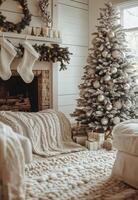 A beautifully decorated Christmas tree with ornaments and presents in a cozy living room setting photo