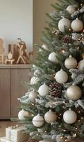 Decorated Christmas tree with elegant ornaments and warm lights in a cozy living room photo