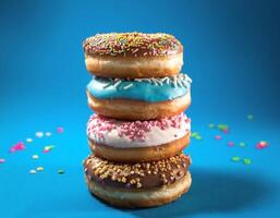 Stack of colorful donuts with various toppings photo