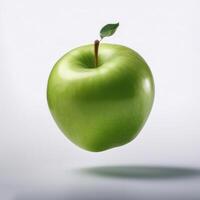 Green apple floating in the air on a clean white background photo