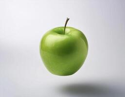 Green apple floating in the air on a clean white background photo