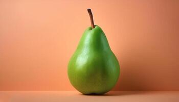 A green pear on a peach background photo