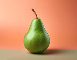 A green pear on a peach background photo