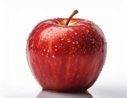 Bright red apple isolated on white background, highlighting the water droplets that stick to it. photo