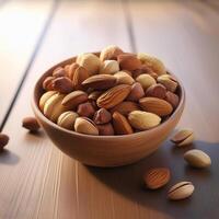 Nuts in a small bowl on the table photo
