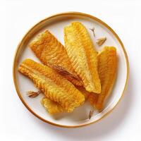 Fried fish fillets on a plate photo