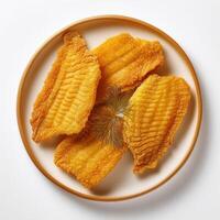 Fried fish fillets on a plate photo