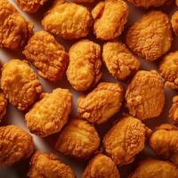 A close up of fried chicken nuggets photo