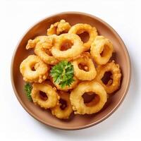 Fried calamari on a plate with parsley photo