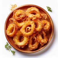 A plate of fried squid on a white background photo