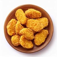 A plate of fried chicken nuggets on a white background photo