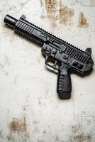 Showcasing the intricate details of a paintball gun the focus is on the trigger and hopper highlighted by bright lighting and soft shadows from an overhead angle. photo