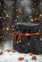 climbing chalk bag features a textured fabric and a drawstring closure with chalk spilling slightly out and soft shadows cast in bright studio lighting. photo