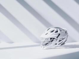 lacrosse helmet showcases its intricate cage and padding details illuminated by bright studio lighting. Soft shadows enhance the minimalist composition emphasizing the sports equipments design. photo