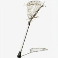 lacrosse stick stands upright with a ball resting delicately in the netting highlighted by soft shadows and bright lighting emphasizing the intricate details of the grip and mesh. photo