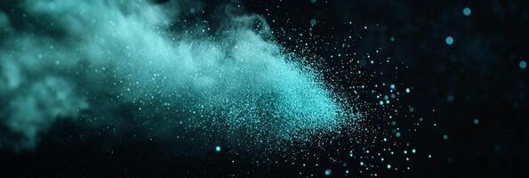 A captivating explosion of vibrant turquoise particles bursts forth, radiating energy as glowing specks dynamically disperse outward, creating a stunning wave of light on a black backdrop. photo