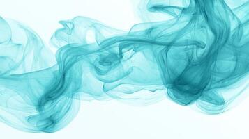 Soft turquoise smoke tendrils weave effortlessly upwards, blending into delicate swirls against a bright white backdrop, showcasing their intricate detail and ethereal beauty. photo
