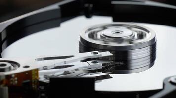 Working hard disk drive with a spinning platter. Starting and stopping HDD platter video