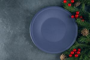 Christmas table setup on dark background. Flat lay, top view, copy spce. Mockup concept photo