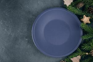 Christmas table setup on dark background. Flat lay, top view, copy spce. Mockup concept photo