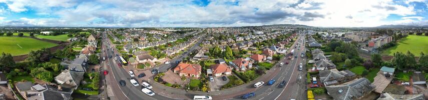 High Angle Wide Panoramic View of Central Edinburgh City of Scotland United Kingdom During Partly Cloudy Day of August 29th, 2024 photo