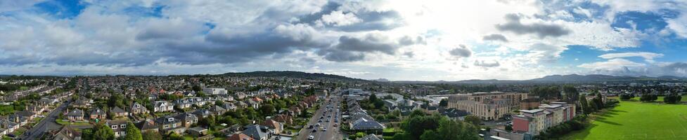 High Angle Wide Panoramic View of Central Edinburgh City of Scotland United Kingdom During Partly Cloudy Day of August 29th, 2024 photo