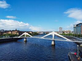 Aerial View of Buildings at Central Glasgow city of Scotland From River Clyde, Great Britain. June 5th, 2024 photo