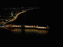 High Angle View of Illuminated Eastbourne City of England United Kingdom During Dark Night of May 9th, 2024 photo