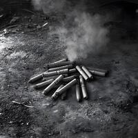 Grey Unhealthy habit Smoked cigarette ash waste on the ground photo