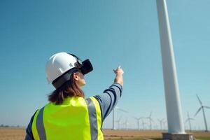 construction worker with outfit wearing VR headset with wind turbine in background photo