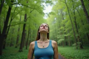 person standing looking up and enjoy the nature sense at the jungle, photo