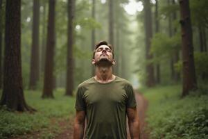 person standing looking up and enjoy the nature sense at the jungle, photo