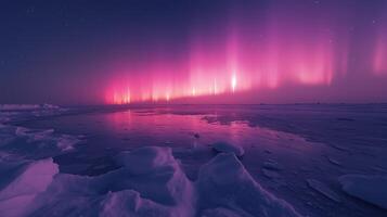 Pink aurora borealis, morthern lights over ice and snow landscape photo