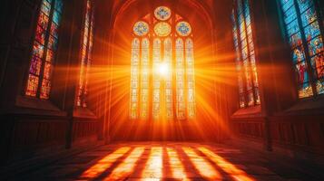 beautiful vibrant stained glass window of the cathedral with piercing rays photo