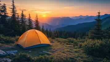 camping tent high in the mountains at sunset photo