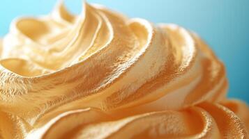 Gold metallic zephyr isolated on a blue background. photo